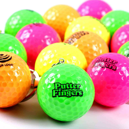 Fourteen mini golf ball keyrings in yellow, orange, green, and pink, each adorned with the Putterfingers logo